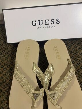 Guess Women's Gold Ruffle Glitter Thong Sandals